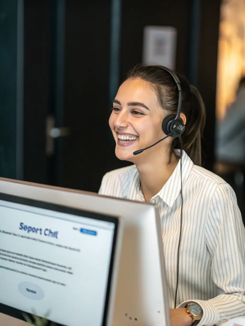 An image of a customer support agent assisting a user via live chat, emphasizing responsive and helpful customer service.
